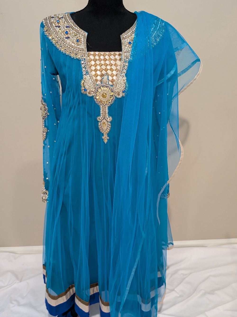 Embellished Turquoise Anarkali Dress with Gold Accents